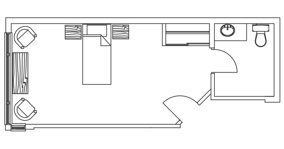 Overhead drawing of a floor plan for assisted living suite. There is a single bed and a private bathroom